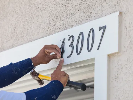Installing house numbers on a new build