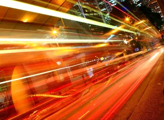 Lights speeding by in a city