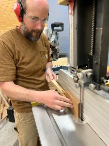 Ryan showing off his woodworking skills.