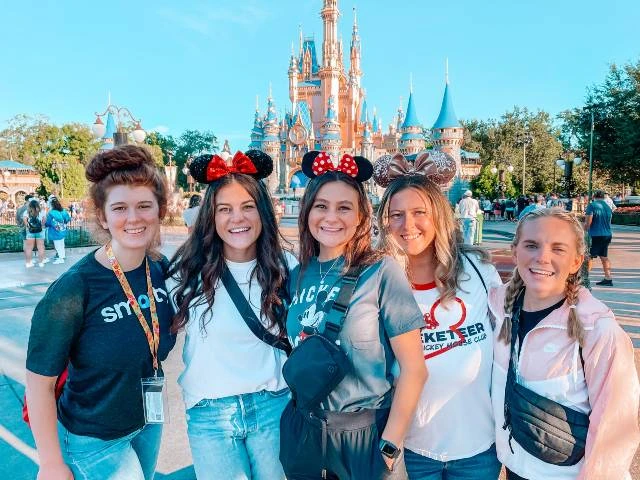 Jenny, Savannah, Caroline, Madelyn, and Raya During a Company Trip to DisneyWorld in 2021