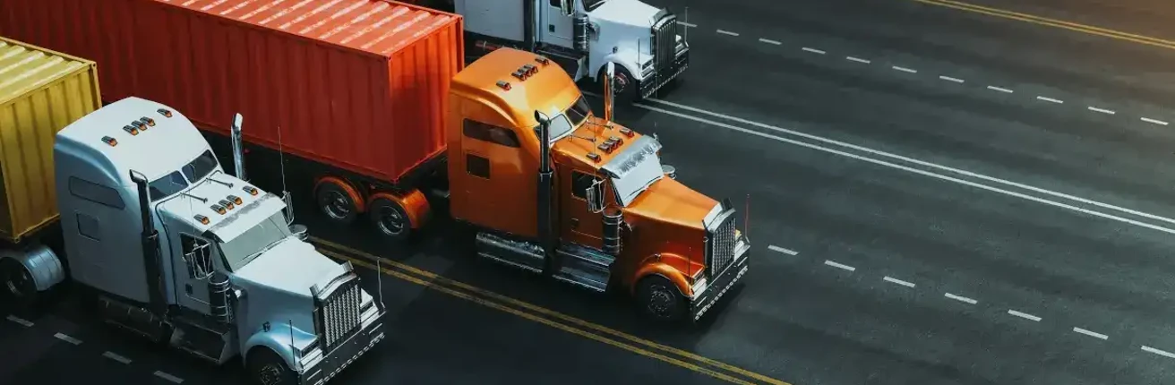 semi trucks driving on freeway