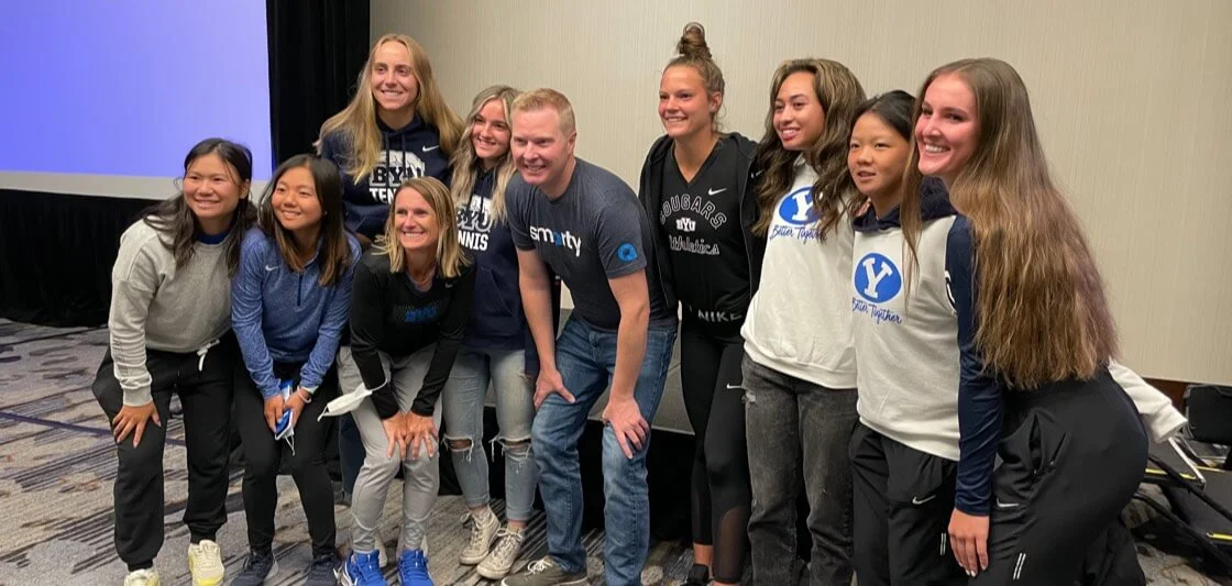 BYU Female Athletes pose with Smarty Founder, Jonathan Oliver, for a photo